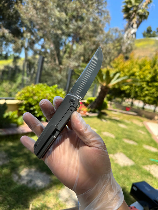 North Mountain Blade Kwaiken Salmon Layered Damascus - 3.4" ZDP-189 Core Steel Drop Point Blade, Titanium Handle