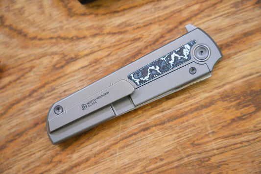 North Mountain Blade Chop Kick Stop Ti - 3.5" M390 Tanto Blade, Titanium with Ceramic Carbon Fibre Inlay Handle