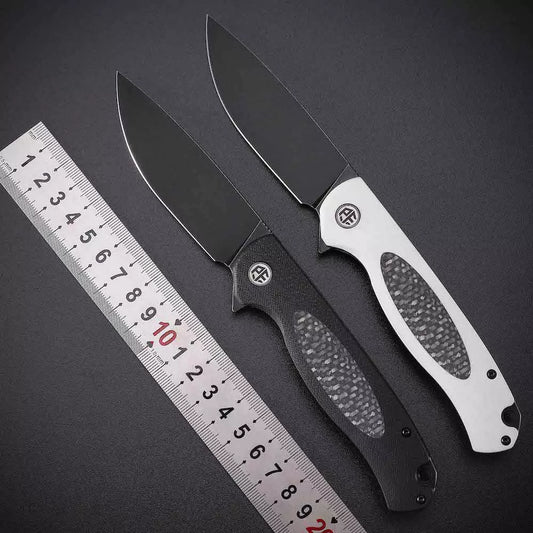 Petrified Fish Stamp PFB03 - 3.58" D2 Black Stonewashed Blade, White G10 With Carbon Fibre Handle, Flipper