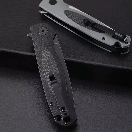 Petrified Fish Stamp PFB03 - 3.58" D2 Black Stonewashed Blade, Black G10 With Carbon Fibre Handle, Flipper