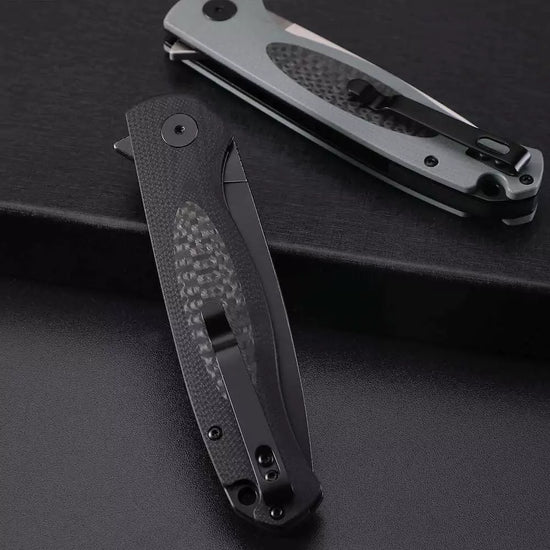 Petrified Fish Stamp PFB03 - 3.58" D2 Black Stonewashed Blade, White G10 With Carbon Fibre Handle, Flipper