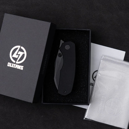 Olitans G057-BB - 2.36" 14C28N Black Stonewashed Blade, Black G10 Handle