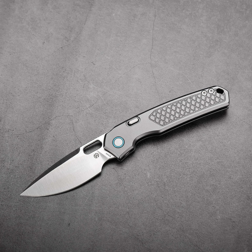 Vosteed Psyop A2202 - 3.32" Elmax Satin Blade, Titanium Patterned Handle