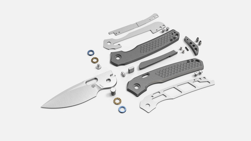 Vosteed Psyop A2202 - 3.32" Elmax Satin Blade, Titanium Patterned Handle