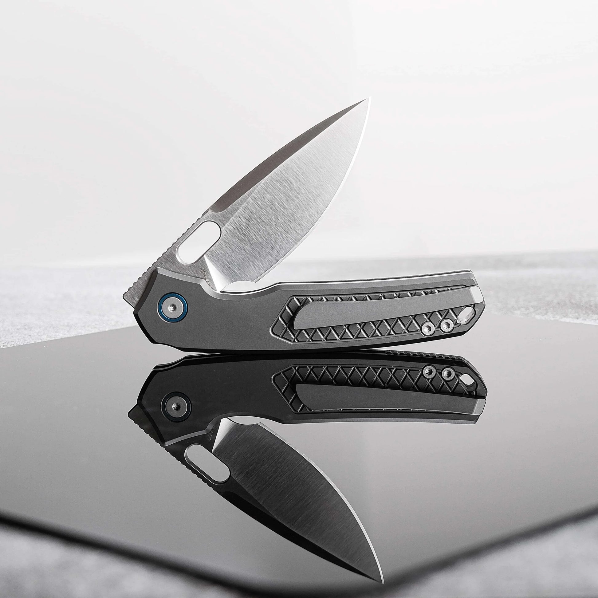 Vosteed Psyop A2202 - 3.32" Elmax Satin Blade, Titanium Patterned Handle